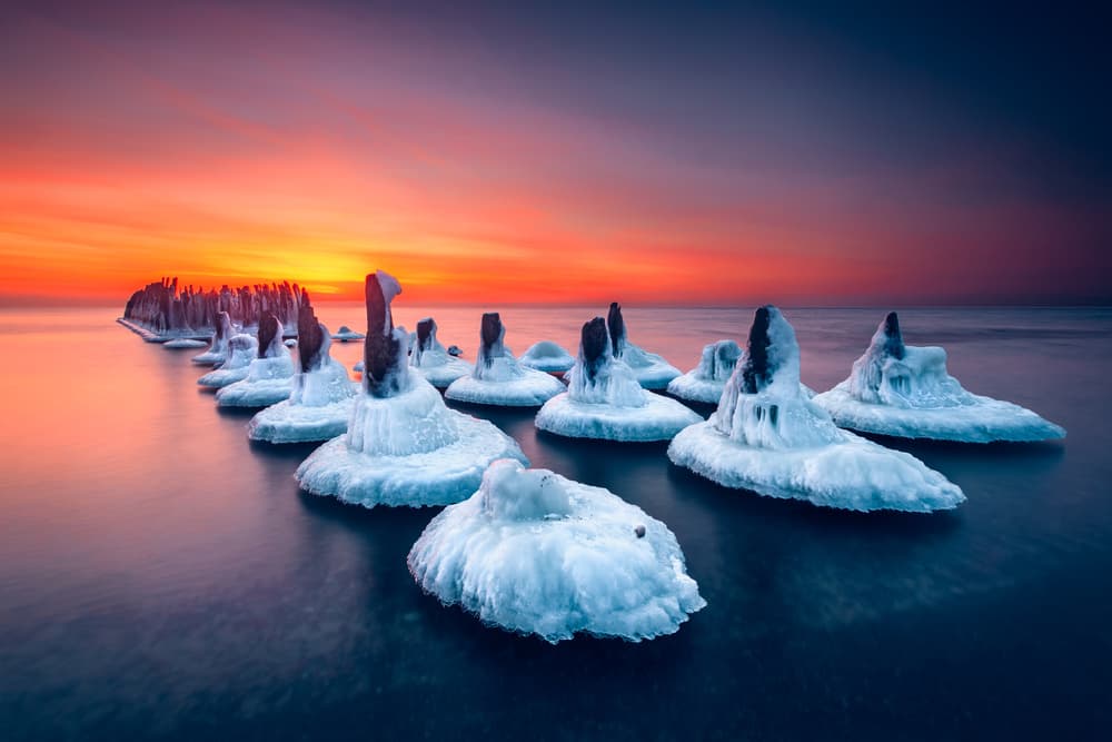 Frozen Winter Sunset by Ruslan Bolgov — canvas wall art