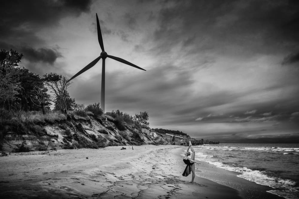 Coastal Wind Turbine Dance by Normunds Kaprano — canvas wall art