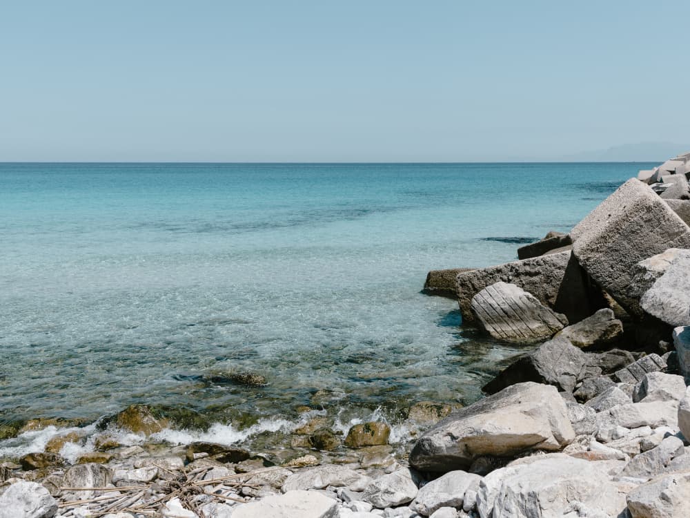 Azure Waters Rocky Coast by Photolovers — canvas wall art