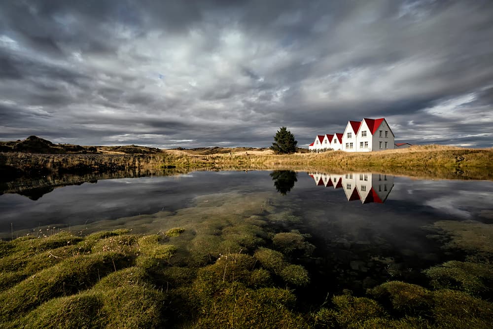 Red Roof Reflections by Þorsteinn H. Ingibergsson — canvas wall art