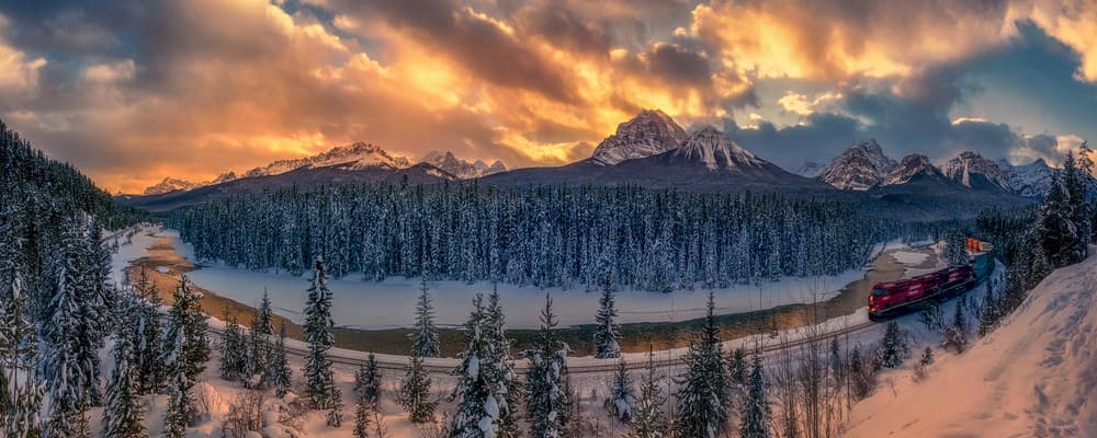 Winter Train Through Mountains by Mei Xu — canvas wall art