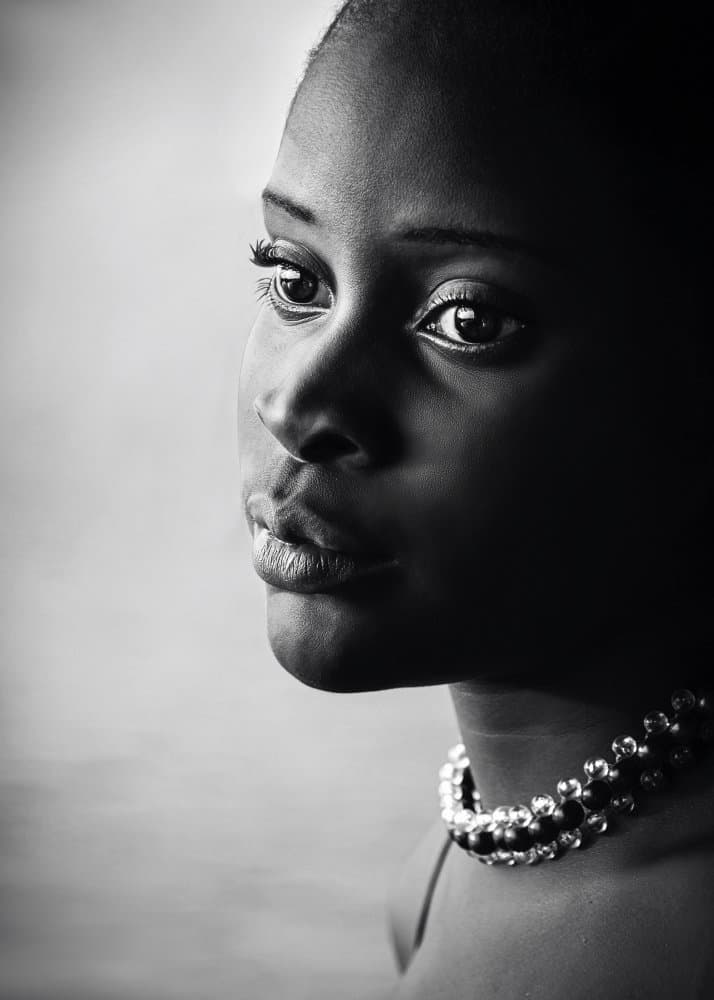 Pensive Black Woman by Emel Sefer — canvas wall art