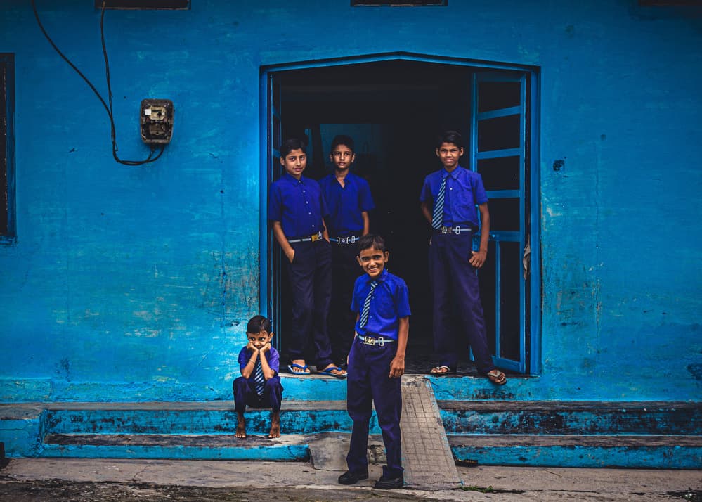 School Boys in Blue by Marco Tagliarino — canvas wall art
