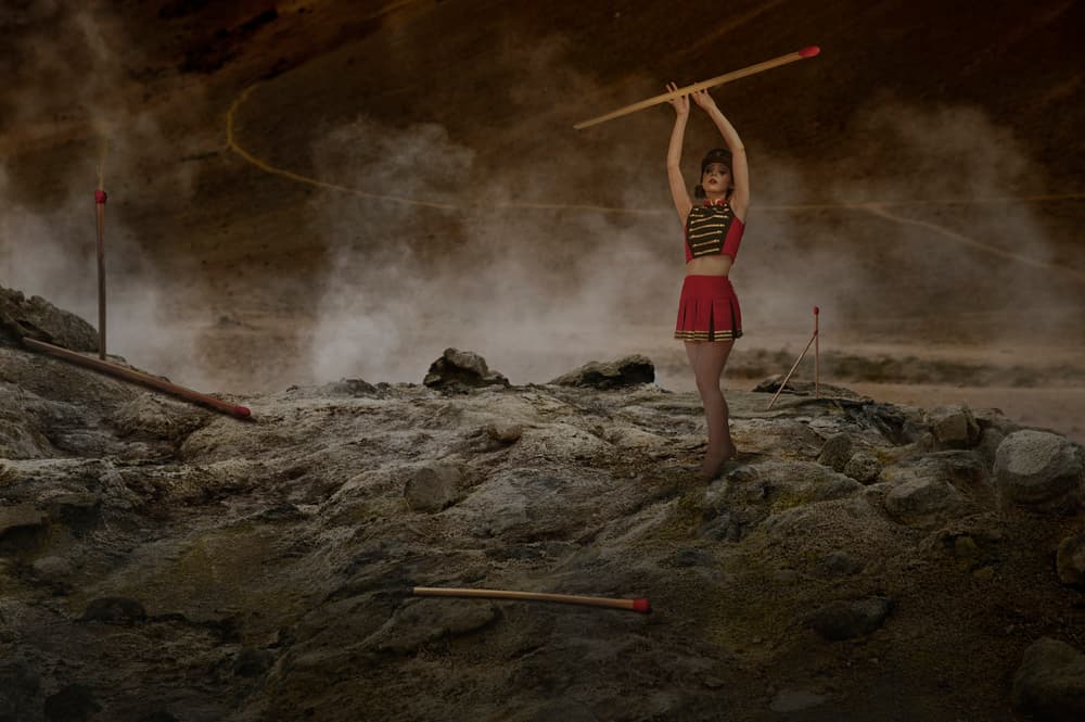 Woman With Giant Matchstick by Christine von Diepenbroek — canvas wall art