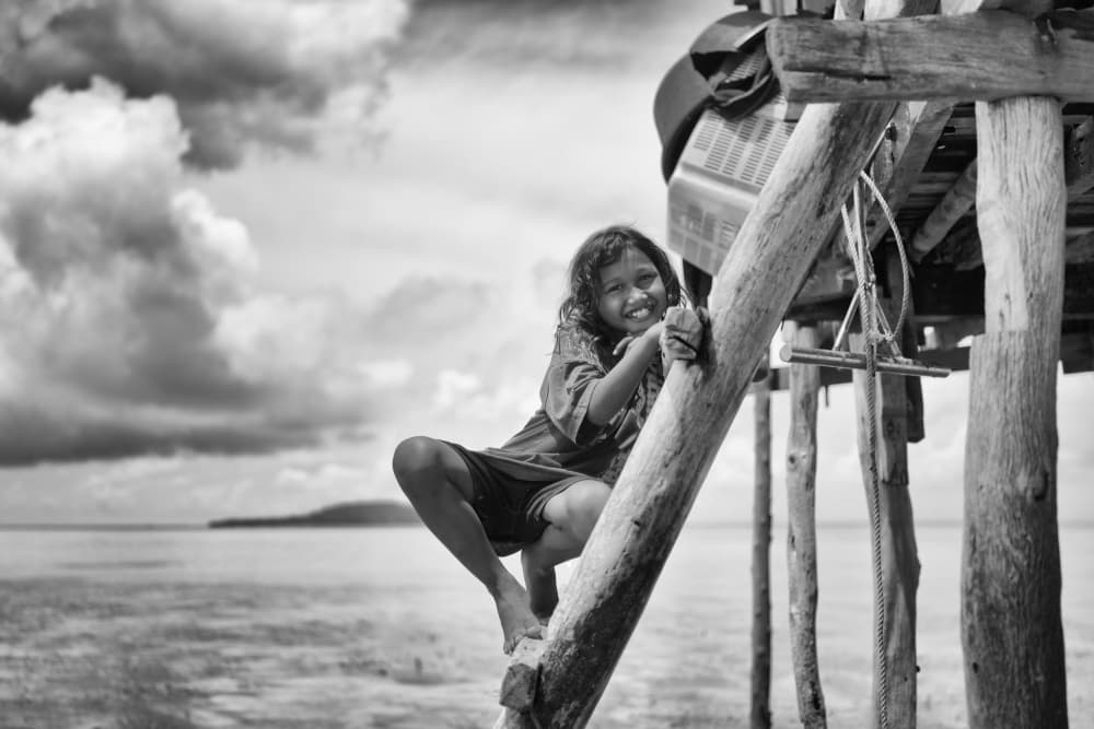 Joyful Island Girl by Kieron Long — canvas wall art