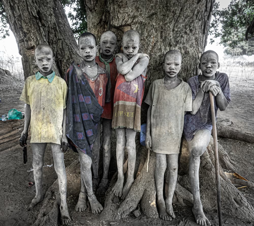 Dusty Village Children by Elena Molina — canvas wall art