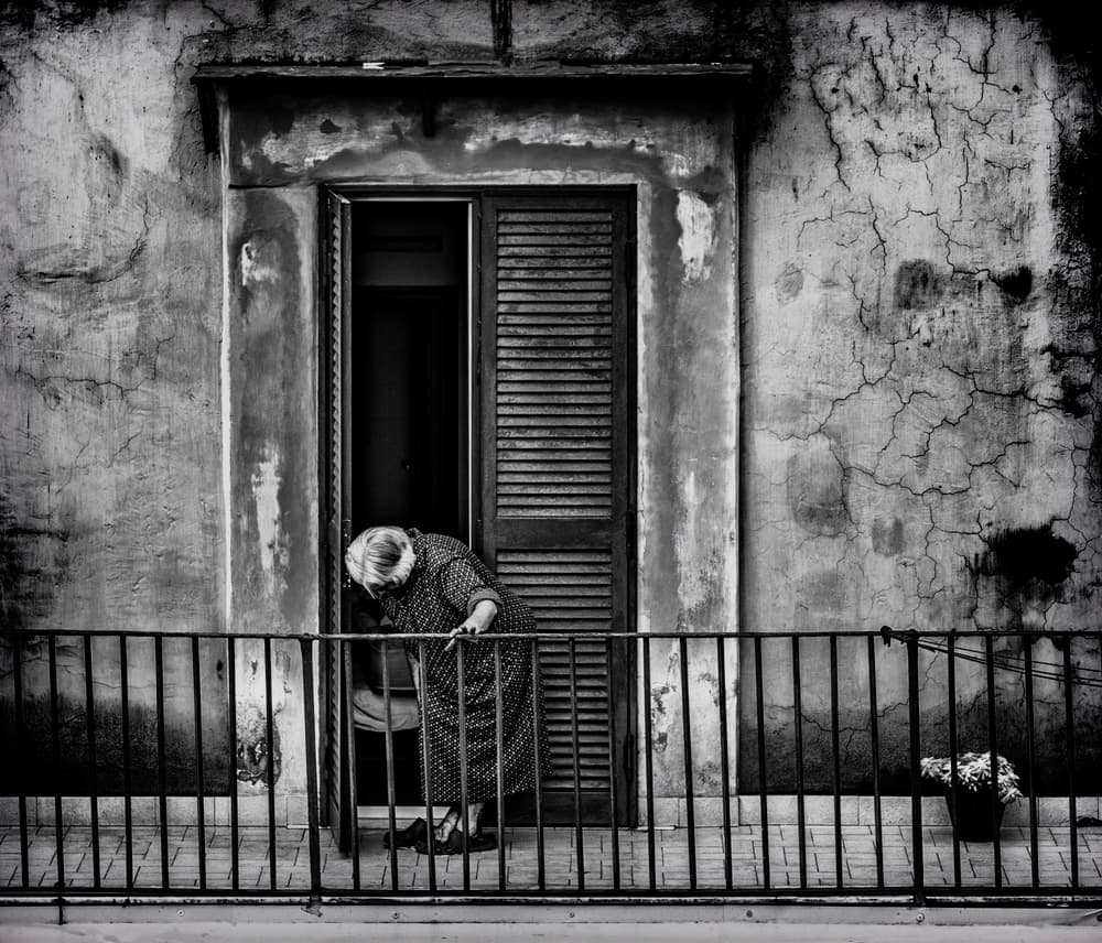 Old Woman Balcony Scene by Ömer Ates Kızıltug — canvas wall art