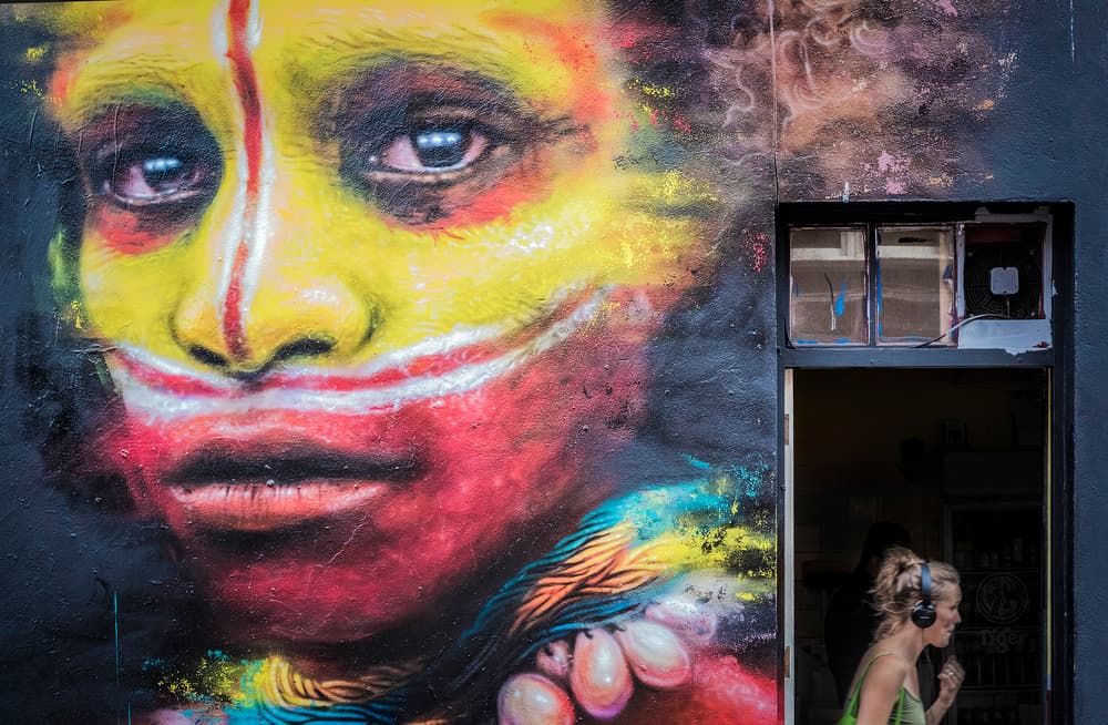 Vibrant Urban Mural Face by Linda Wride — canvas wall art