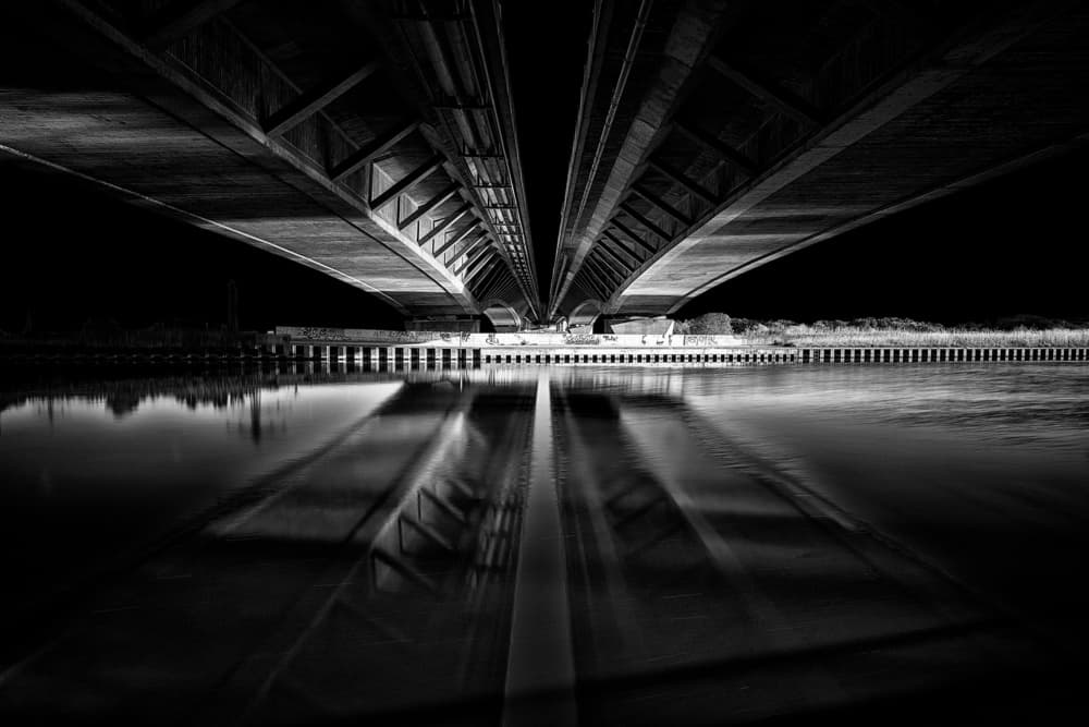 Dark Bridge Reflection by Roland Weber — canvas wall art