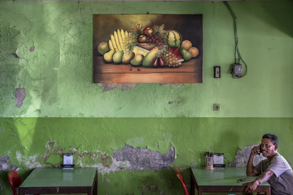 Green Cafe Conversation by Marco Tagliarino — canvas wall art