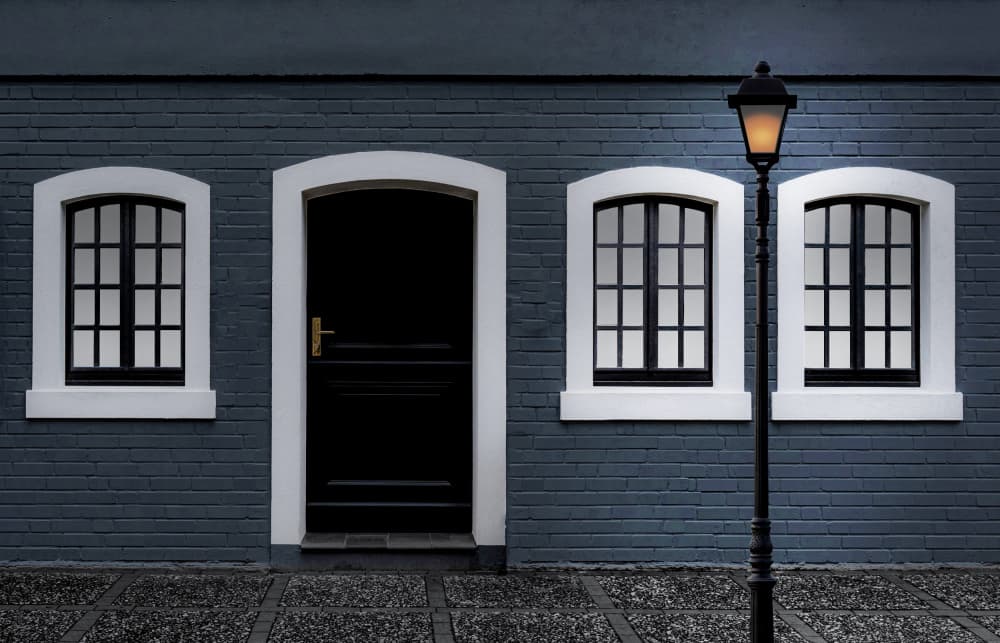 Lamplit City Home by Roland M Schwerdtfeger — canvas wall art