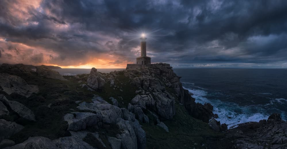 Dramatic Lighthouse Sunset by Carlos F. Turienzo — canvas wall art