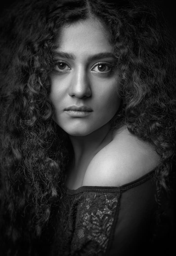 Elegant Curly Woman by Mehdi Mokhtari — canvas wall art