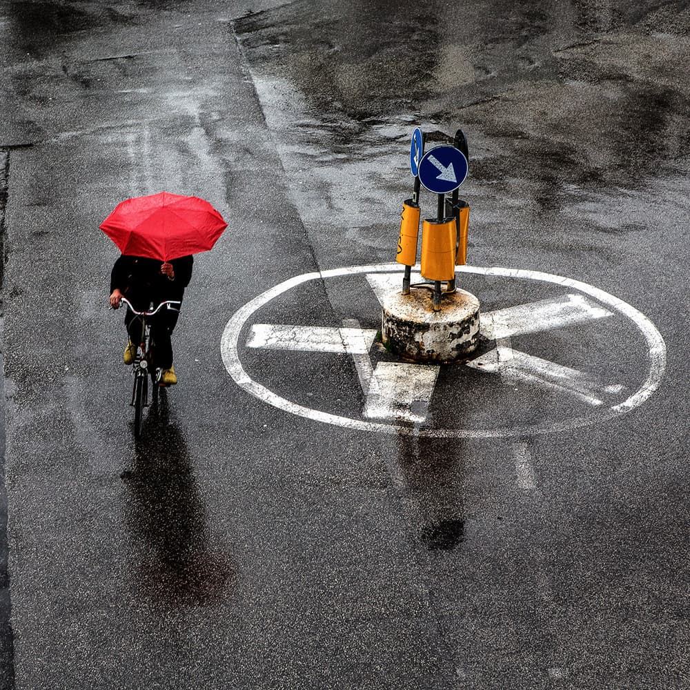Red Umbrella Ride by Massimo Della Latta — canvas wall art