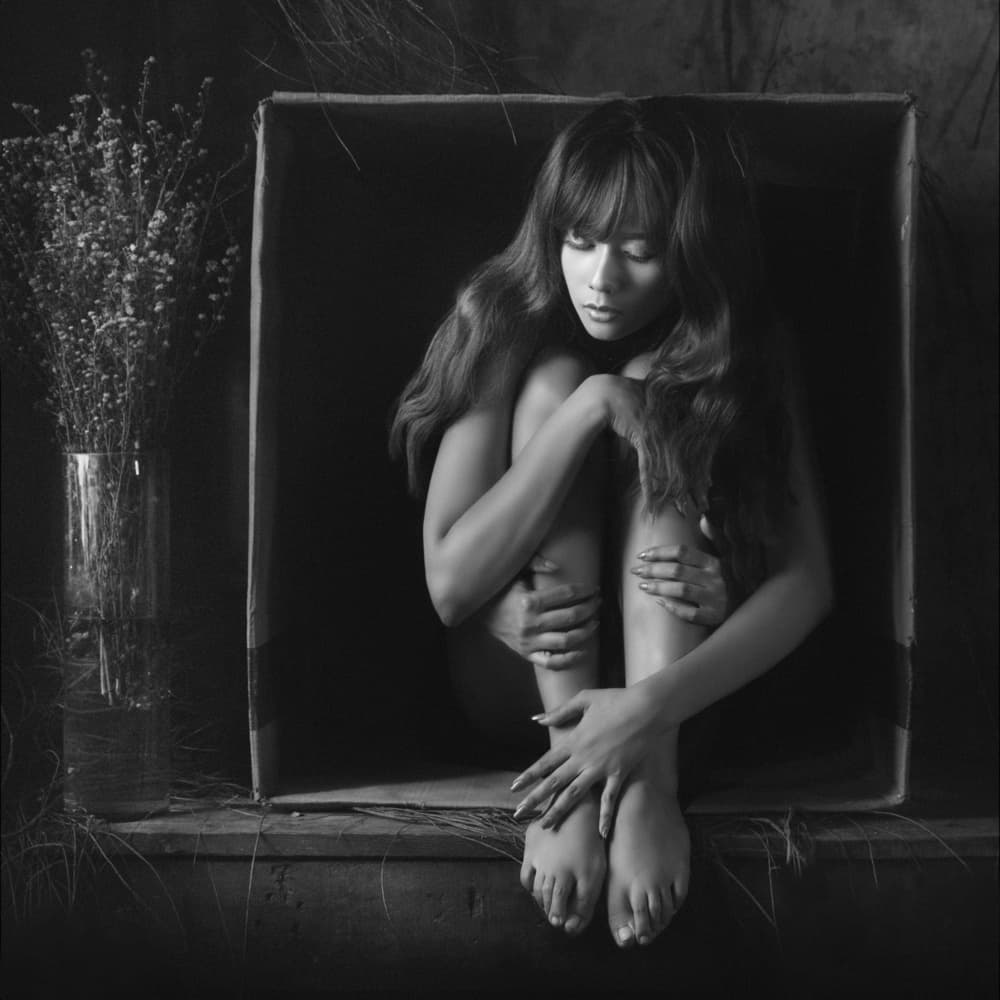 Pensive Woman In Box by Sebastian Kisworo — canvas wall art
