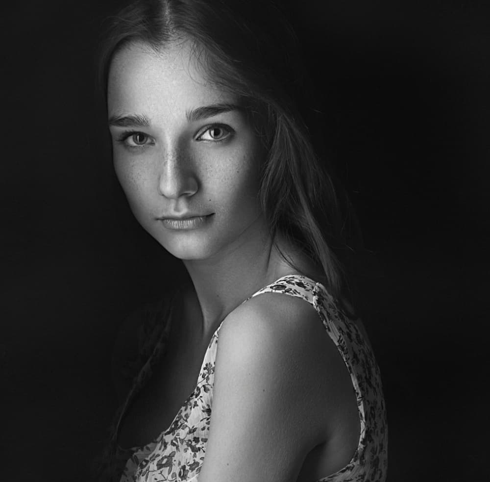 Pensive Young Woman by Danil Rudoi — canvas wall art
