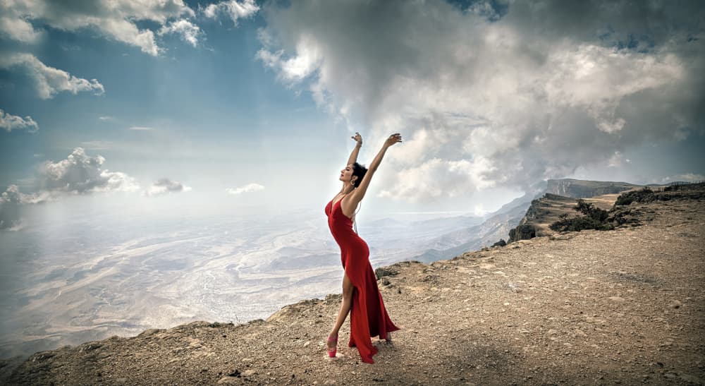 Red Dress Mountain Dance by Waldemar Szmidt — canvas wall art