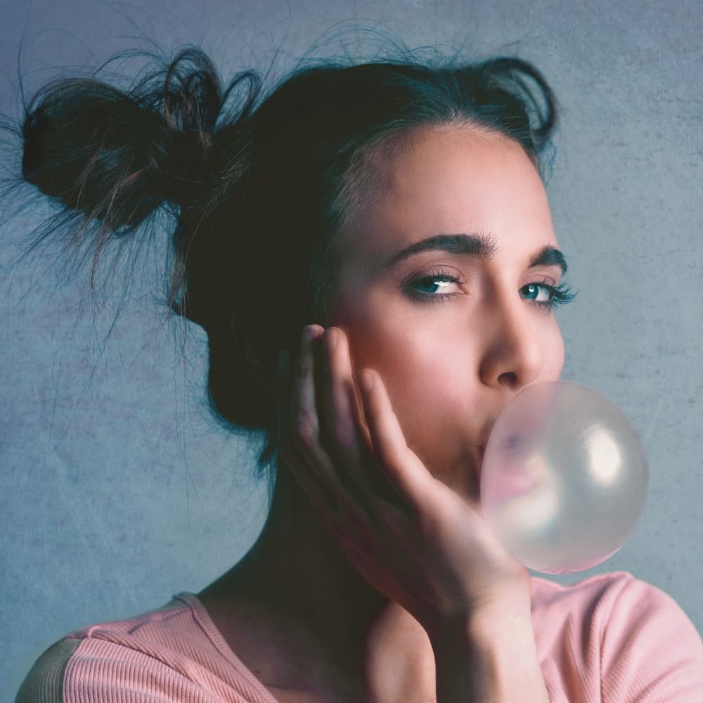 Woman Blowing Bubblegum by Mike Kreiten — canvas wall art