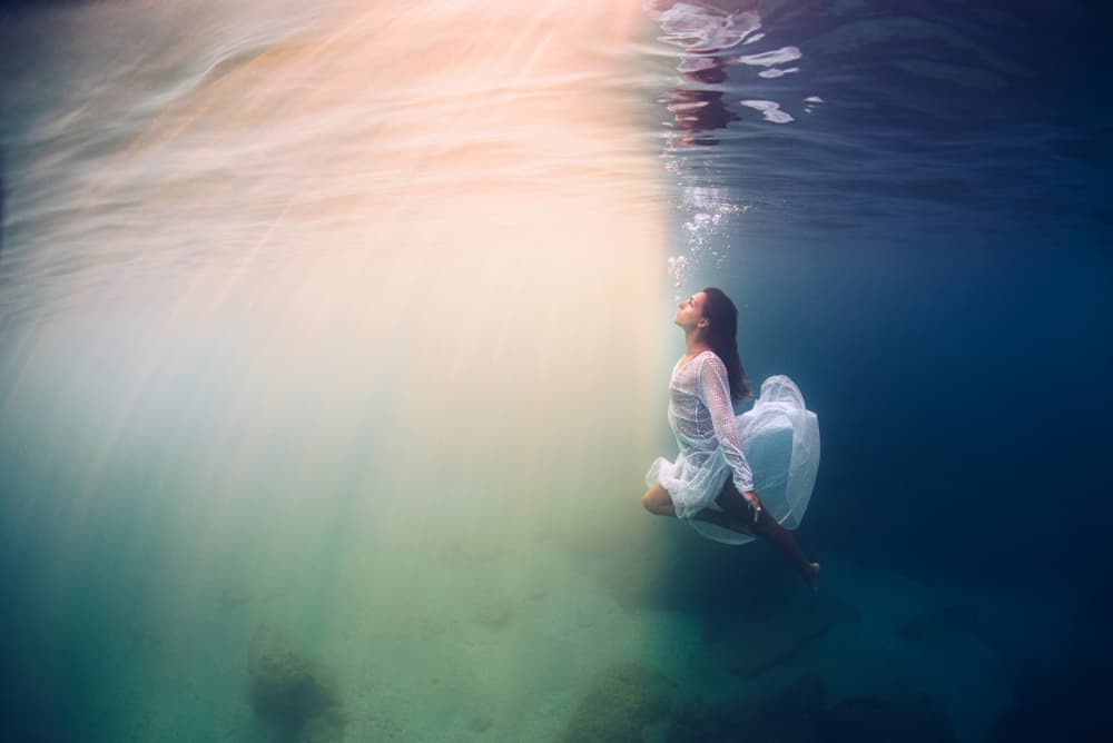 Woman Floating In Light by Davide Lopresti — canvas wall art