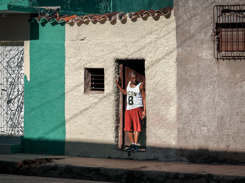 Man in Old Doorway by Andy Bauer — canvas wall art