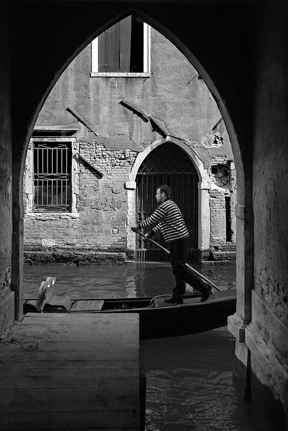 Gondolier Through Archway by Jure Kravanja — canvas wall art