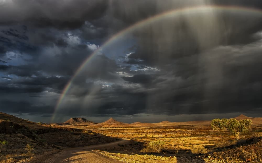Dramatic Desert Rainbow by Pavol Stranak — canvas wall art