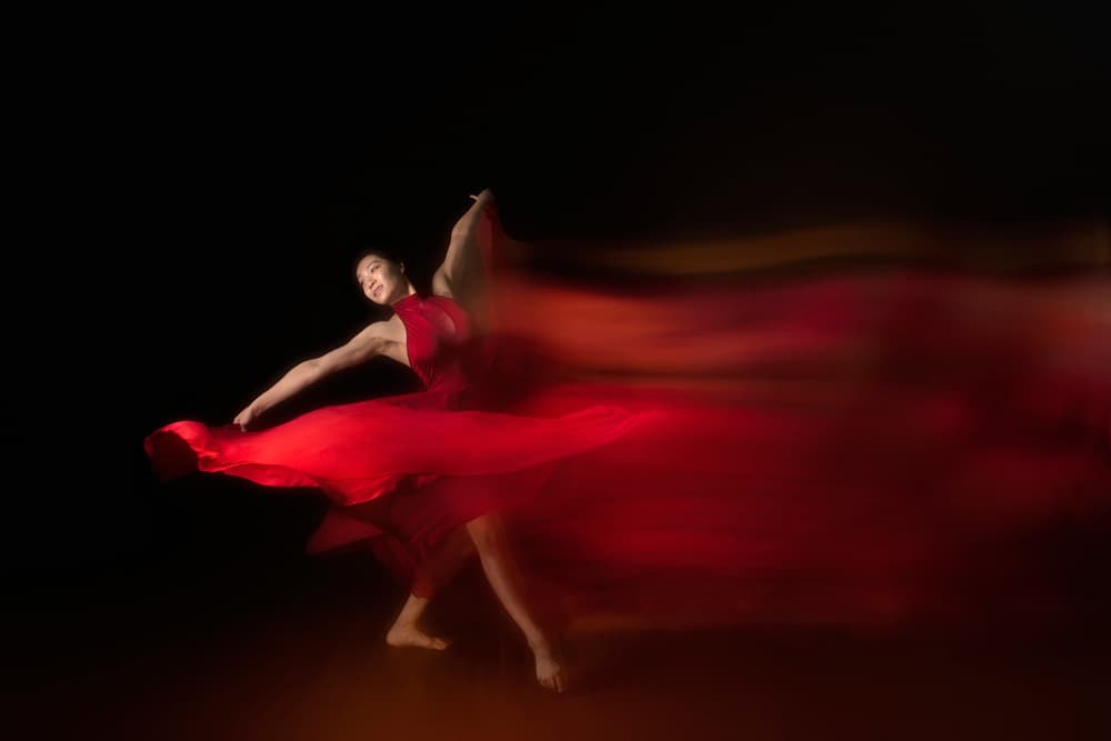 Swirling Red Dance by Rob Li — canvas wall art