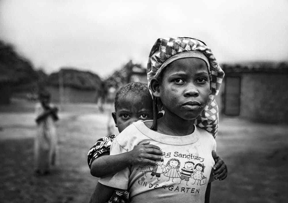 African Sisters Portrait by João Coelho — canvas wall art