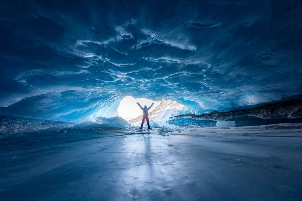 Ice Cave Explorer by Yongnan Li (李永男) — canvas wall art
