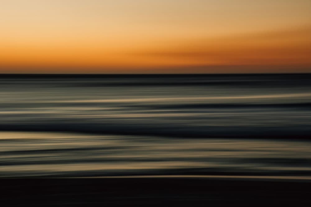 Ocean Motion Sunset by Tyler Walker — canvas wall art