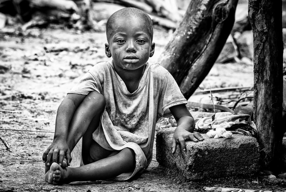Pensive African Child by Joxe Inazio Kuesta Garmendia — canvas wall art