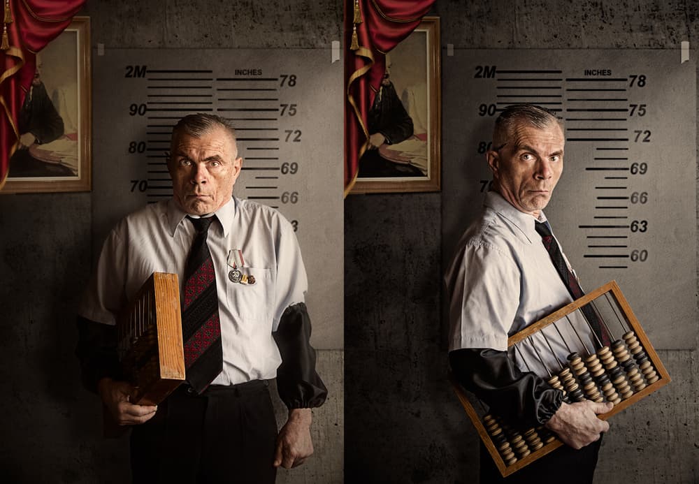 Stern Man With Abacus by Svetlana Melik-Nubarova — canvas wall art