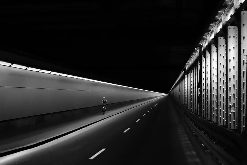 Lone Cyclist Tunnel Ride by Andy Dauer — canvas wall art