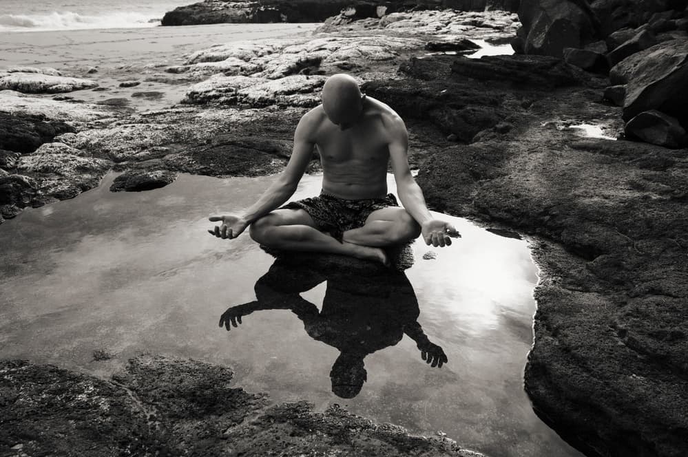 Meditating Man Reflection by Mel Brackstone — canvas wall art