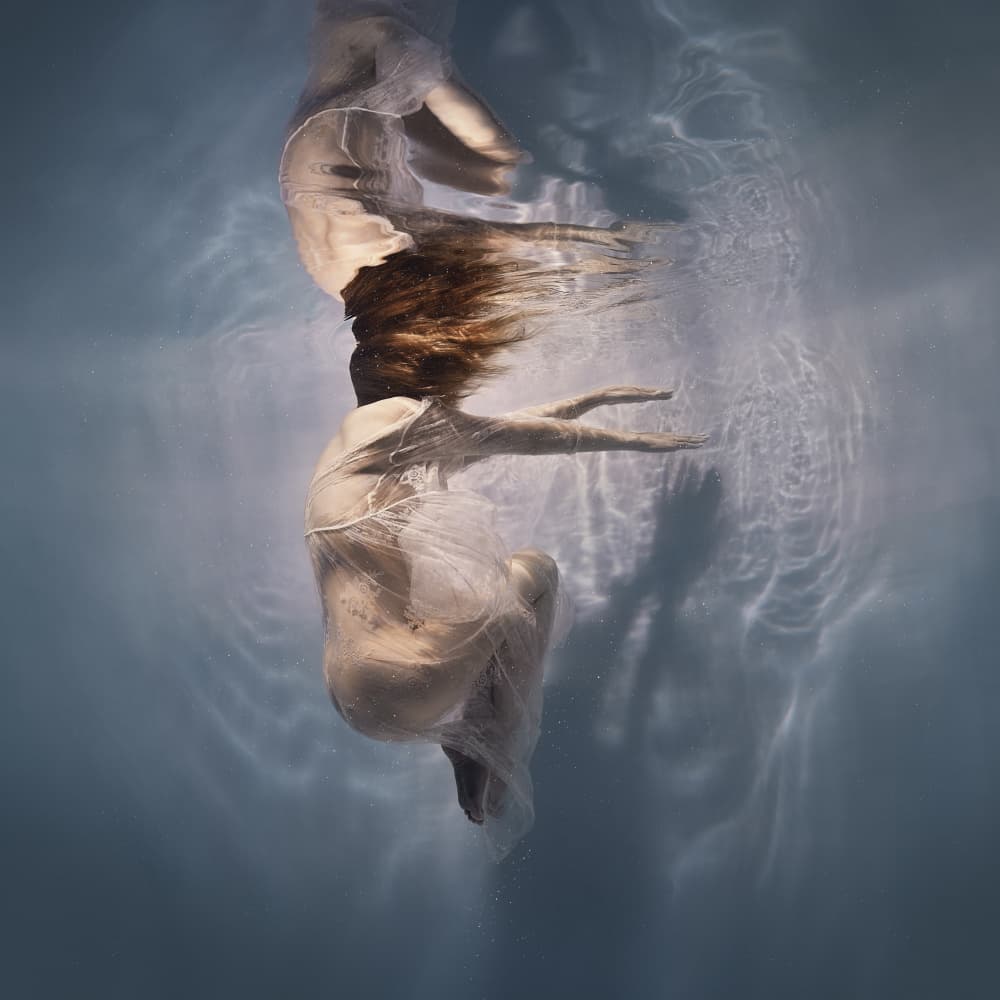 Floating Woman Underwater by Dmitry Frizel — canvas wall art