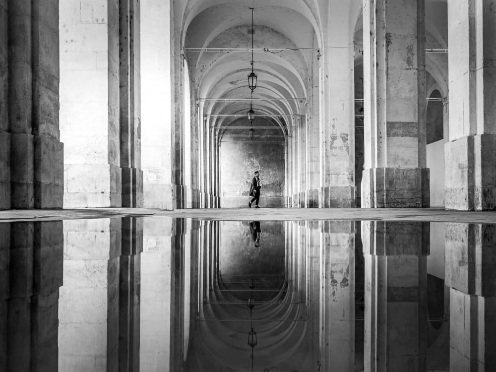 Lone Figure Archway Reflection by Adam Dauria ☂ — canvas wall art