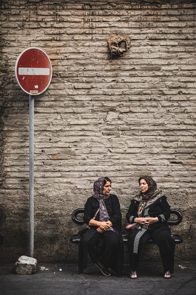 Street Corner Conversation by Marco Tagliarino — canvas wall art