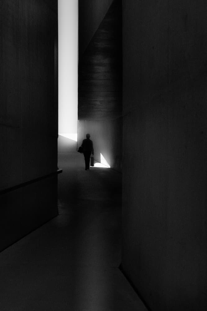 Solitary Figure Dark Hall by Olavo Azevedo — canvas wall art