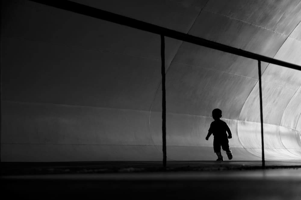 Lone Child in Tunnel by MingLun Tsai (蔡明倫) — canvas wall art