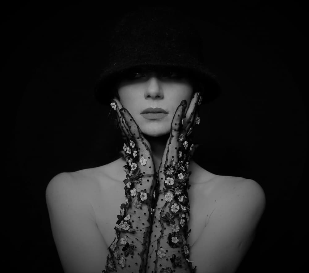 Woman in Floral Gloves by Yoram GIL — canvas wall art