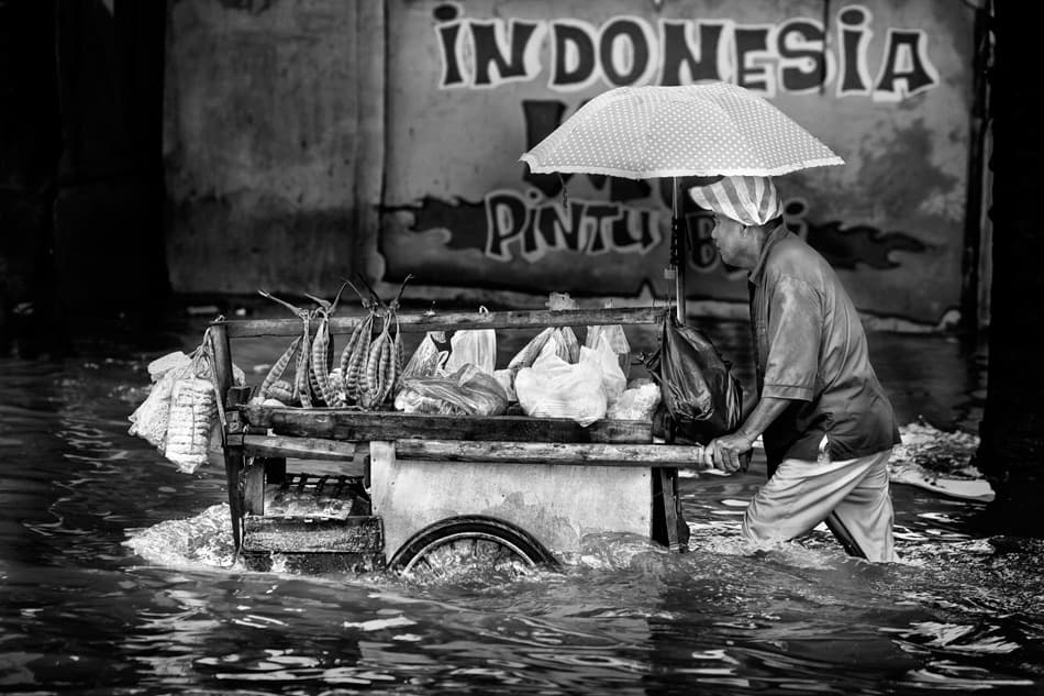 Indonesian Vendor Floodwaters by Hari Sulistiawan — canvas wall art