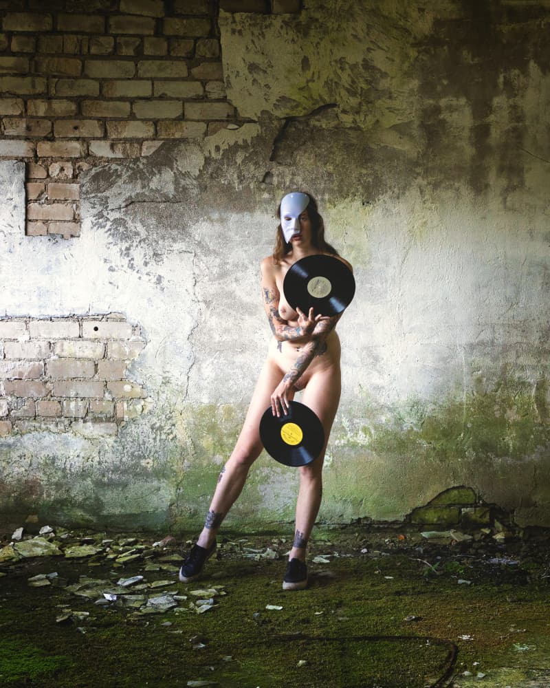 Masked Woman Vinyl Records by Normunds Kaprano — canvas wall art