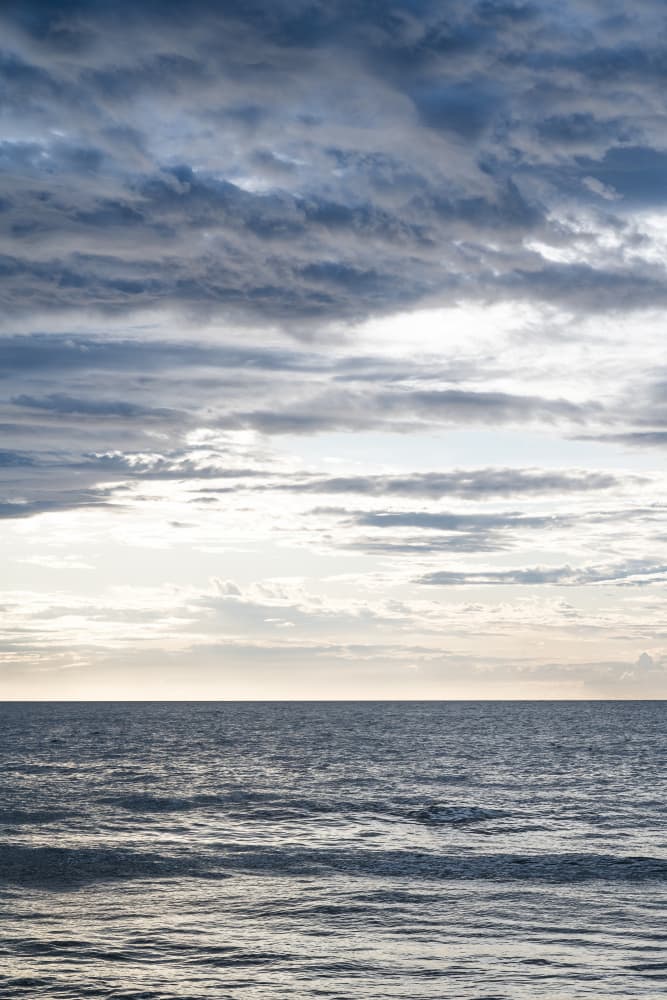 Serene Ocean Cloudy Sky by Photolovers — canvas wall art