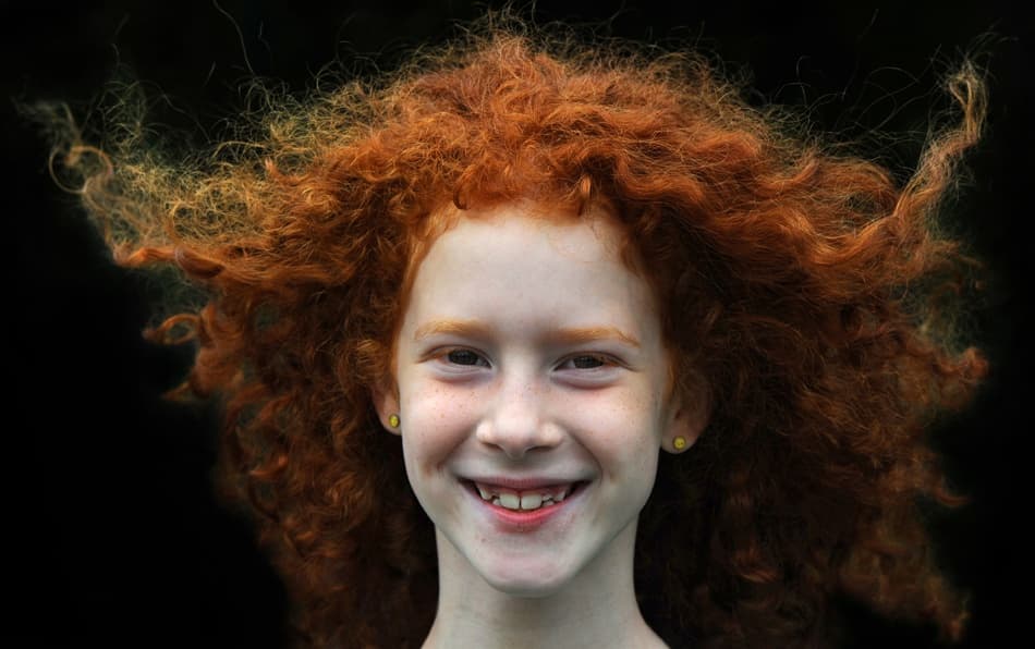 Joyful Red Haired Girl by Huib Limberg — canvas wall art