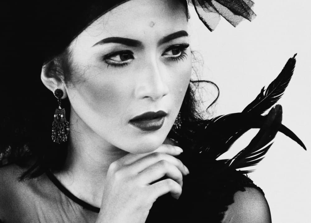 Glamorous Feathered Portrait by Kahar Lagaa — canvas wall art