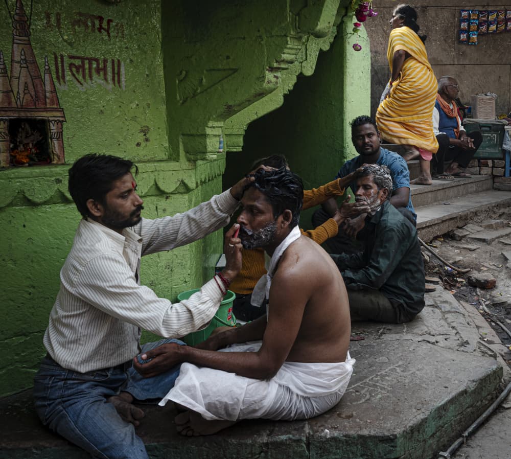 Indian Street Barber by Elena Molina — canvas wall art