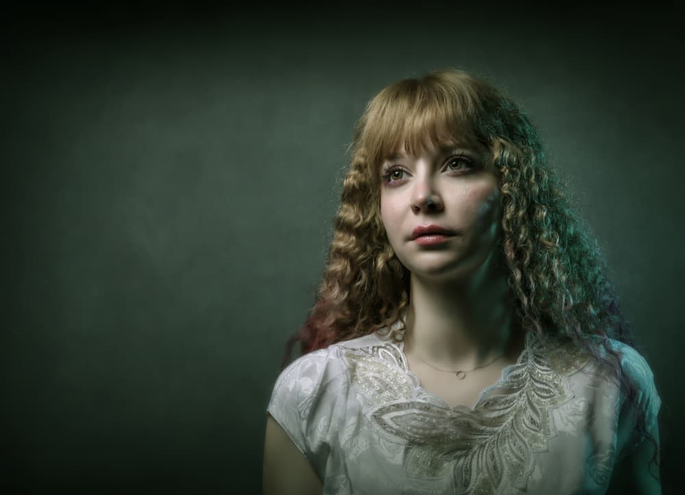 Melancholy Young Woman by Moein Hasheminasab — canvas wall art