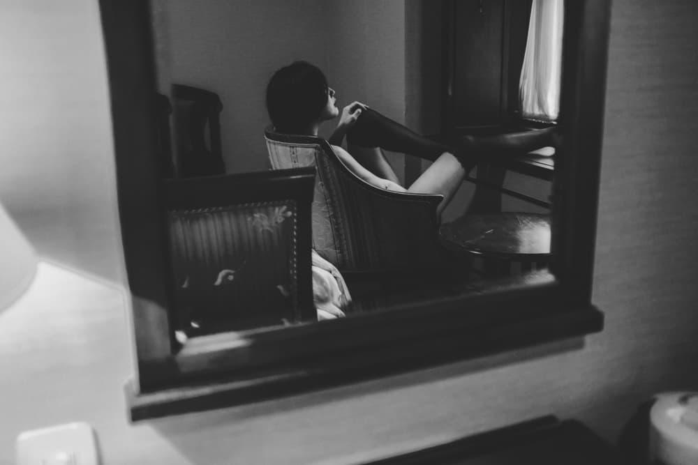 Pensive Woman in Mirror by Takaaki Ishikura — canvas wall art