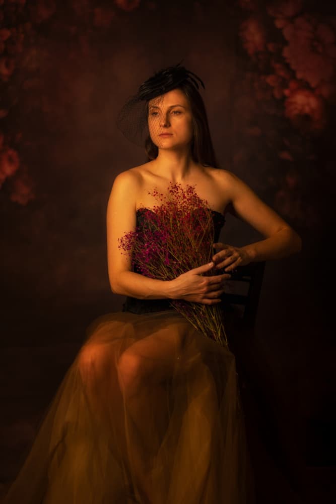 Elegant Woman with Flowers by Amnon Eichelberg — canvas wall art