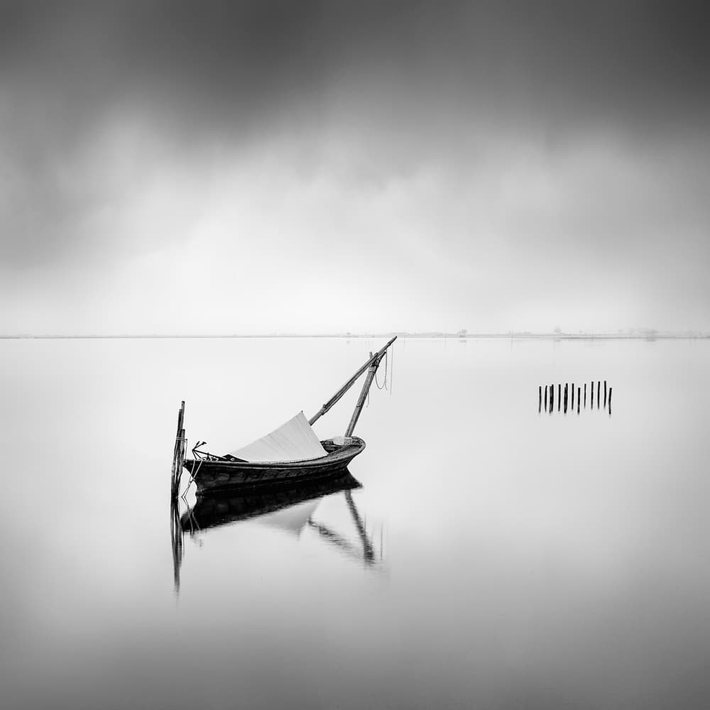 Misty Lake Boat by George Digalakis — canvas wall art